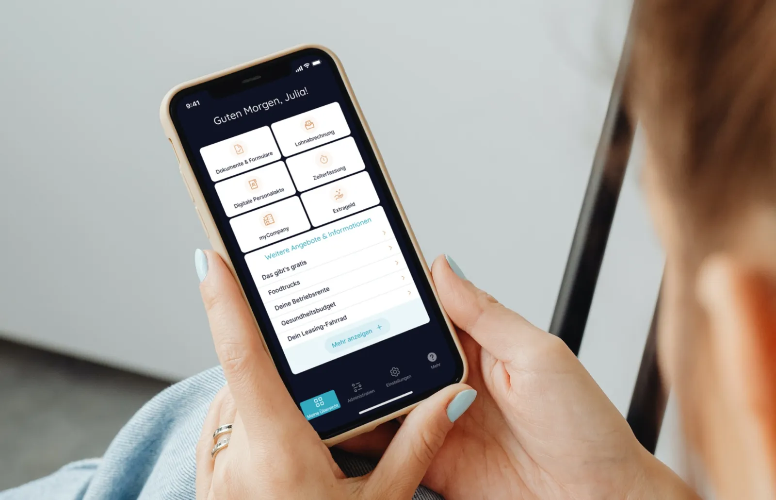 A person using the be+ employee benefits and HR app on their phone